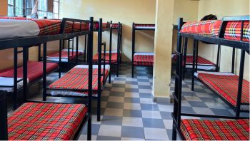 Bunk beds with red plaid bedding