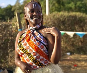 girl smiling and looking off camera